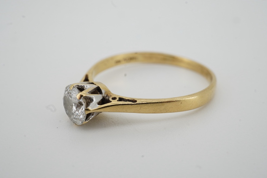 A modern 19ct gold and solitaire diamond ring, the stone weighing 0.50ct, size O, gross weight 2.2 grams.
